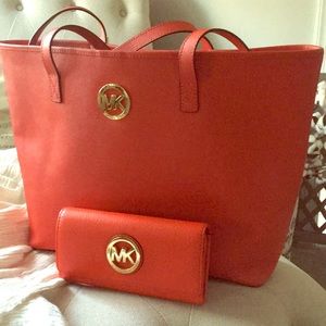 Michael Kors handbag with matching wallet.